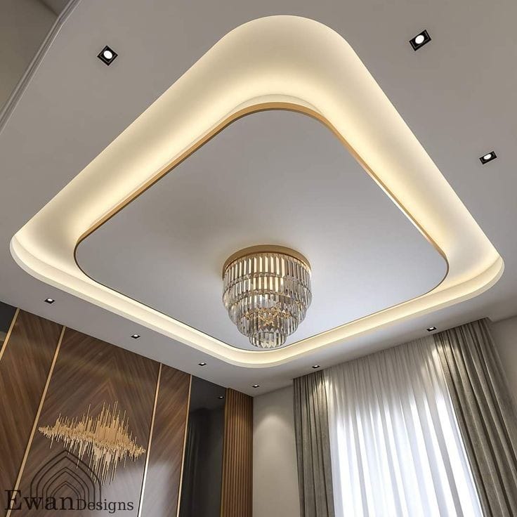 Curved Gypsum False Ceiling with Gold Trim & Chandelier
